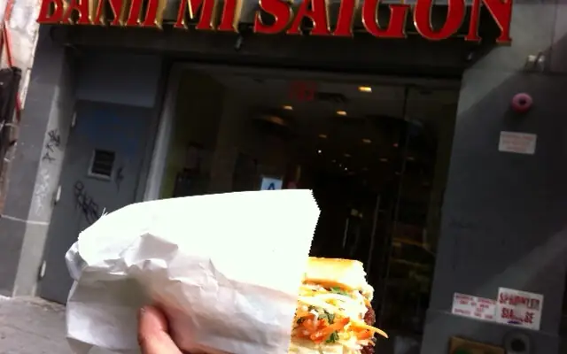 Banh Mi Saigon shopfront and sandwich in New York City