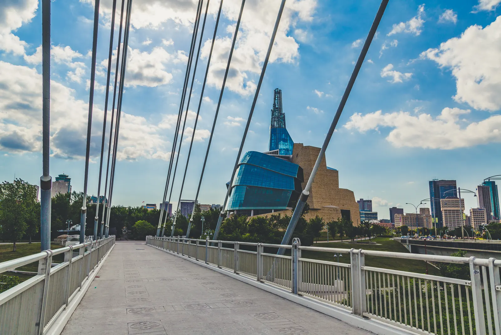 Esplanade Riel pedestrian bridge and the Winnipeg skyline across the Red River